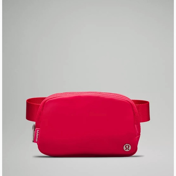 lululemon athletica Handbags - Lululemon BeltBag in Lipstick Pink NWOT